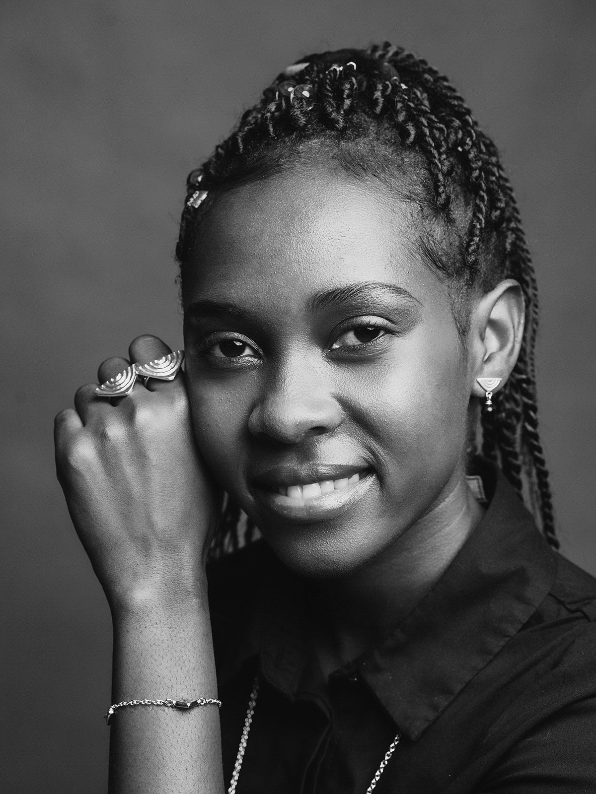 Model wearing Patrick Mavros Vakadzi Drop Earrings Sterling Silver with Black Onyx